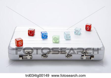 Stock Photo - letters of success on the brief case. Fotosearch