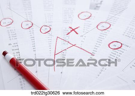Marked Test Papers With A Red Color Pencil View Large Photo Image Stock Photograph - Marked Test Papers With A Red Color Pencil. Fotosearch