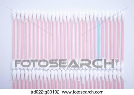 One blue cotton swab and other white cotton swab in a row View Large Photo Image Stock Image - One blue cotton swab and other white cotton swab in a row. Fotosearch