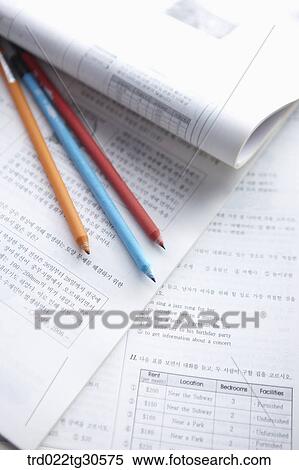 Stock Photography - Open Books And Pencils. Fotosearch
