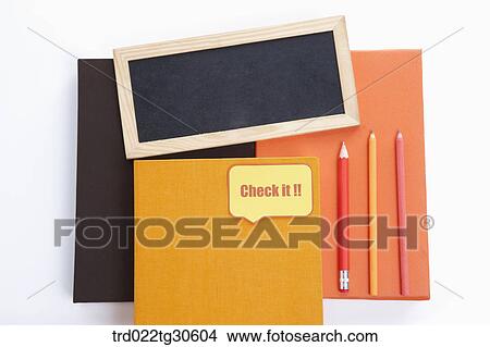 Orange Books And A Black Board View Large Photo Image Picture - Orange Books And A Black Board. Fotosearch