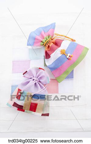Patched colorful lucky bags View Large Photo Image Stock Photography - Patched colorful lucky bags. Fotosearch