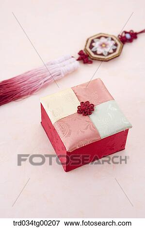 Red patched traditional box and red traditional accessory View Large Photo Image Stock Photo - Red patched traditional box and red traditional accessory . Fotosearch