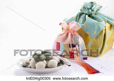 Rice cake, patched lucky bag, and traditional wrapped package View Large Photo Image Stock Photography - Rice cake, patched lucky bag, and traditional wrapped package. Fotosearch