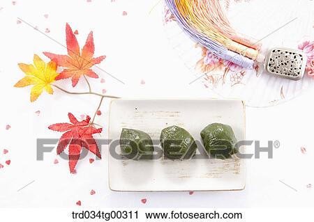 Rice cake, traditional clothes accessory, and a fan View Large Photo Image Stock Image - Rice cake, traditional clothes accessory, and a fan. Fotosearch