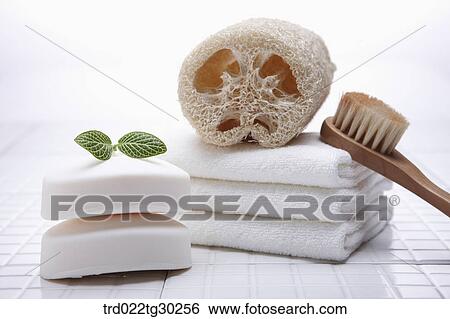 Soaps, folded towels, and bath tools View Large Photo Image Stock Photograph - Soaps, folded towels, and bath tools. Fotosearch