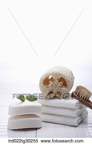 Soaps, folded towels, and bath tools View Large Photo Image Stock Photography - Soaps, folded towels, and bath tools. Fotosearch