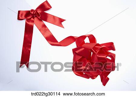 Tangled red ribbon View Large Photo Image Picture - Tangled red ribbon. Fotosearch