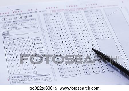 Stock Photography - Test Answer Sheet With Black Pen. Fotosearch