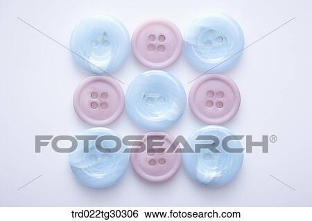 Two Different Types Of Round Buttons View Large Photo Image Stock Photograph - Two Different Types Of Round Buttons. Fotosearch