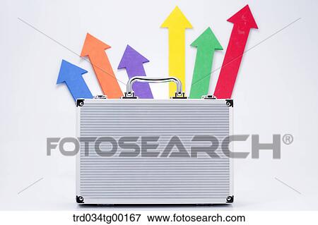 Stock Photo - various colors of arrow signs and brief case. Fotosearch