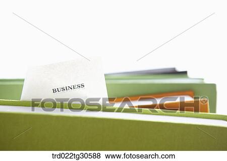Various Colors Of Books And A Piece Of Paper View Large Photo Image Stock Photo - Various Colors Of Books And A Piece Of Paper. Fotosearch