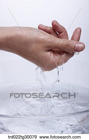 washing hand in basin View Large Photo Image Stock Photo - washing hand in basin. Fotosearch