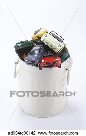waste bucket is filled with miniature cars View Large Photo Image Stock Image - waste bucket is filled with miniature cars. Fotosearch