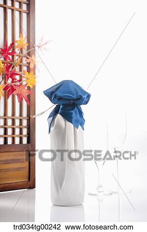 Wrapped bottles, a glass, and red envelope with Korean traditional door behind View Large Photo Image Stock Image - Wrapped bottles, a glass, and red envelope with Korean traditional door behind. Fotosearch