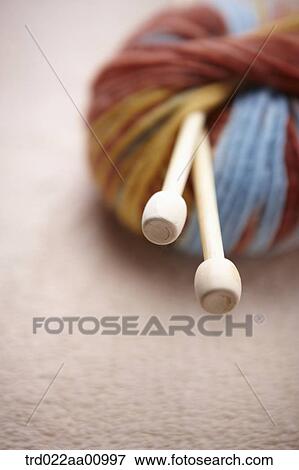 A ball of colorful wool and knitting needles View Large Photo Image Stock Photo - A ball of colorful wool and knitting needles. Fotosearch