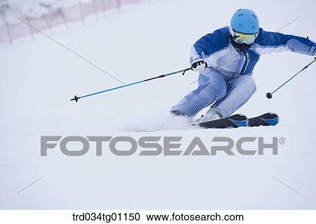 A man skiing on the slope View Large Photo Image Stock Image - A man skiing on the slope . Fotosearch