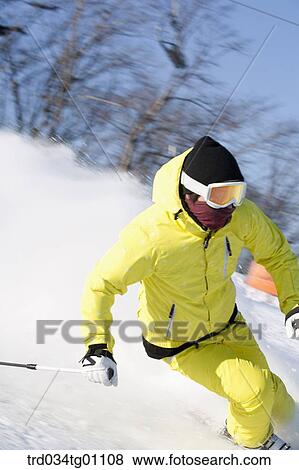 A man skiing on the slope View Large Photo Image Stock Photo - A man skiing on the slope . Fotosearch