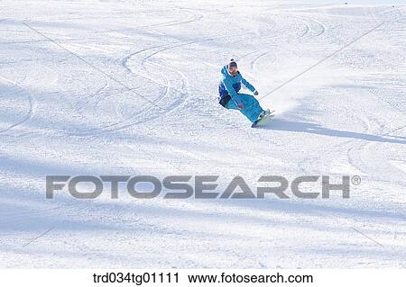 A man snowboarding on the slope View Large Photo Image Stock Image - A man snowboarding on the slope. Fotosearch