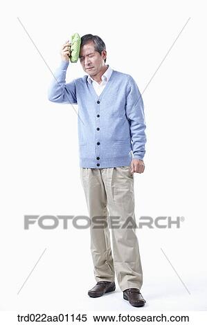 A painful elderly man with headache View Large Photo Image Stock Photography - A painful elderly man with headache . Fotosearch