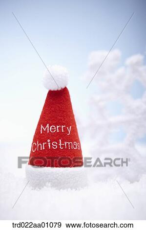 A red Santa Clause hat and white snowflake on the snow View Large Photo Image Stock Photo - A red Santa Clause hat and white snowflake on the snow. Fotosearch