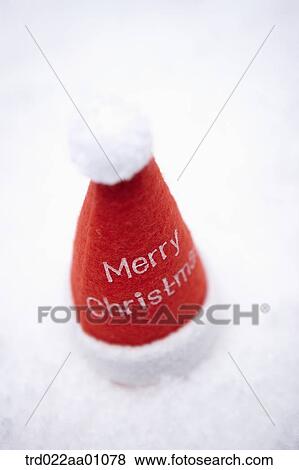 A red Santa Clause hat on the snow View Large Photo Image Stock Photo - A red Santa Clause hat on the snow. Fotosearch