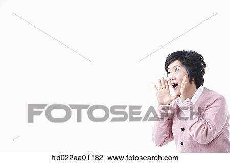 Stock Image - A shouting out elderly woman. Fotosearch