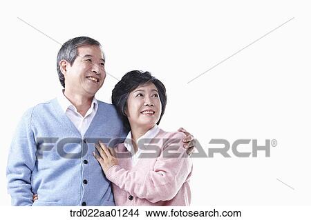 An elderly man and woman looking at the sky together View Large Photo Image Picture - An elderly man and woman looking at the sky together . Fotosearch