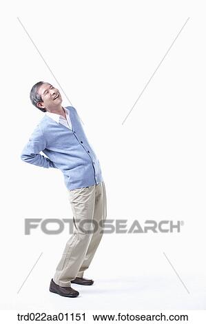 An elderly man with backache View Large Photo Image Stock Image - An elderly man with backache . Fotosearch