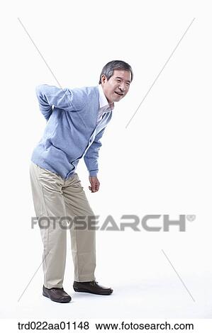 An elderly man with backache View Large Photo Image Stock Photo - An elderly man with backache . Fotosearch