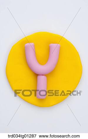 The alphabet Y shaped pink clay on the yellow circle clay View Large Photo Image Stock Photo - The alphabet Y shaped pink clay on the yellow circle clay . Fotosearch