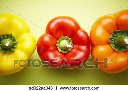 The colorful bell peppers with the green background View Large Photo Image Stock Image - The colorful bell peppers with the green background. Fotosearch