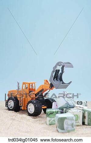 The crane truck with foreign currency blocks View Large Photo Image Stock Photography - The crane truck with foreign currency blocks. Fotosearch