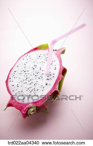 The dragon fruit in half with the pink straw in it View Large Photo Image Stock Image - The dragon fruit in half with the pink straw in it. Fotosearch