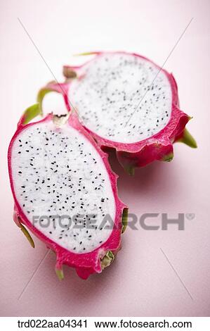 The dragon fruit in half with the pink background View Large Photo Image Stock Image - The dragon fruit in half with the pink background. Fotosearch