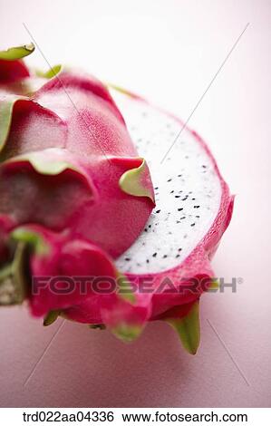 The dragon fruit in half with the pink background View Large Photo Image Stock Photograph - The dragon fruit in half with the pink background. Fotosearch