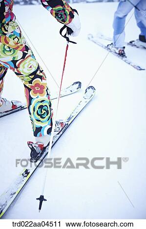 The feet of people wearing the ski gear View Large Photo Image Stock Image - The feet of people wearing the ski gear. Fotosearch