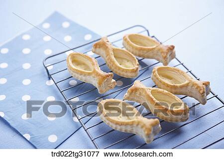The fish shaped cookie on the baking ware View Large Photo Image Stock Photo - The fish shaped cookie on the baking ware. Fotosearch