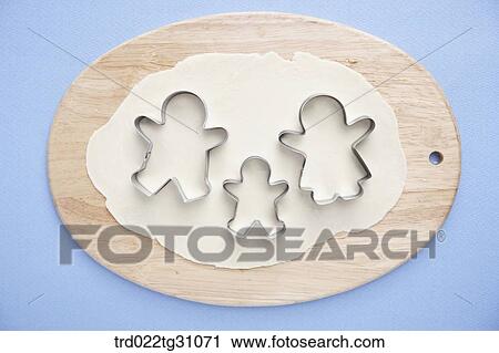 The ginger man cookie cutters on the dough View Large Photo Image Stock Image - The ginger man cookie cutters on the dough. Fotosearch