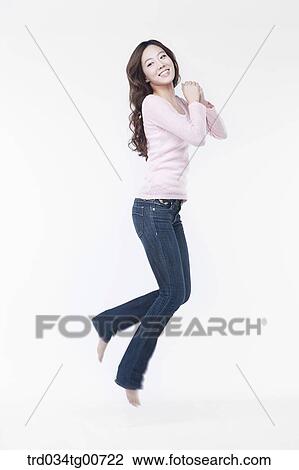 Stock Image - The jumping woman . Fotosearch