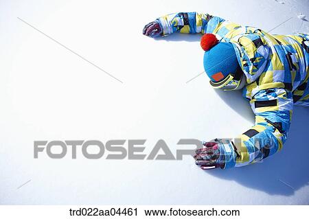 The man wearing snowboarding wear on the snow View Large Photo Image Stock Image - The man wearing snowboarding wear on the snow. Fotosearch