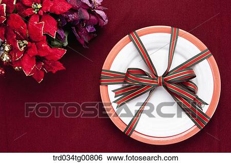The pate with red and green ribbon and red flowers View Large Photo Image Stock Photograph - The pate with red and green ribbon and red flowers. Fotosearch
