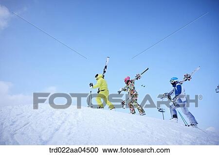 The people climbing the slope with the ski gear View Large Photo Image Stock Image - The people climbing the slope with the ski gear. Fotosearch