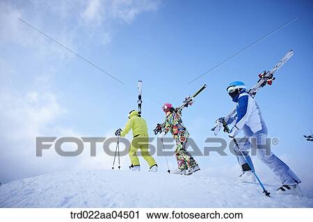 The people climbing the slope with the ski gear View Large Photo Image Stock Image - The people climbing the slope with the ski gear. Fotosearch