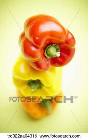 The piled colorful bell peppers with the green background View Large Photo Image Stock Photography - The piled colorful bell peppers with the green background. Fotosearch