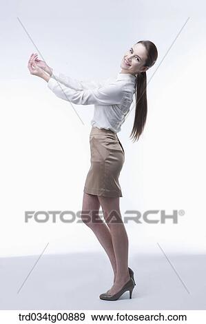 The presenting woman with her hands View Large Photo Image Stock Photo - The presenting woman with her hands. Fotosearch