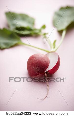 The red turnip in half and green leaves with the pink background View Large Photo Image Stock Image - The red turnip in half and green leaves with the pink background. Fotosearch