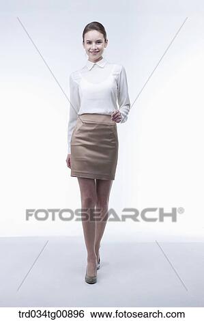 Stock Photograph - The standing woman from the front. Fotosearch