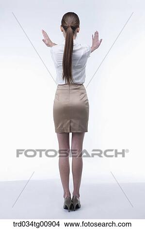 The standing woman with her arms crossing View Large Photo Image Picture - The standing woman with her arms crossing. Fotosearch