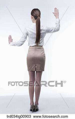 The standing woman with her palms flat View Large Photo Image Stock Image - The standing woman with her palms flat. Fotosearch